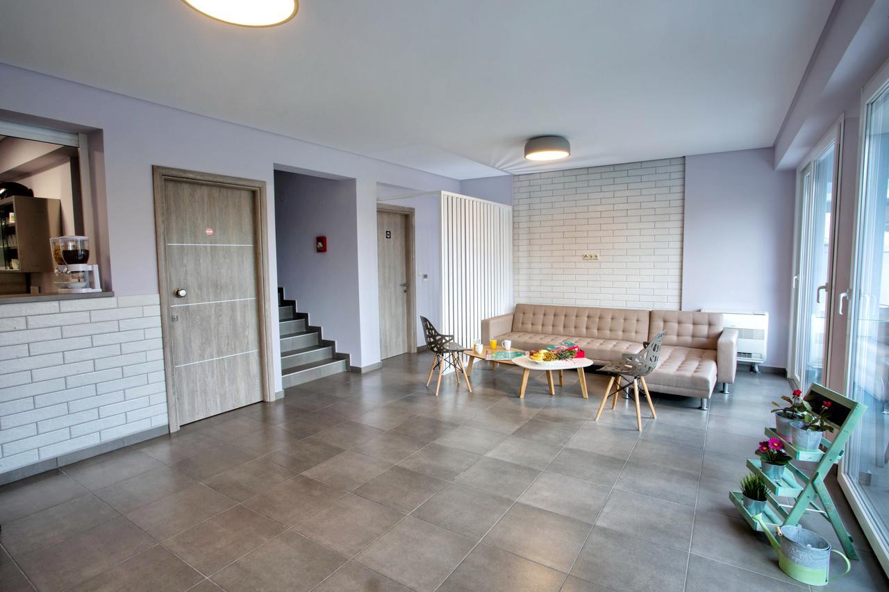 Isalos Suites Néa Péramos Εξωτερικό φωτογραφία