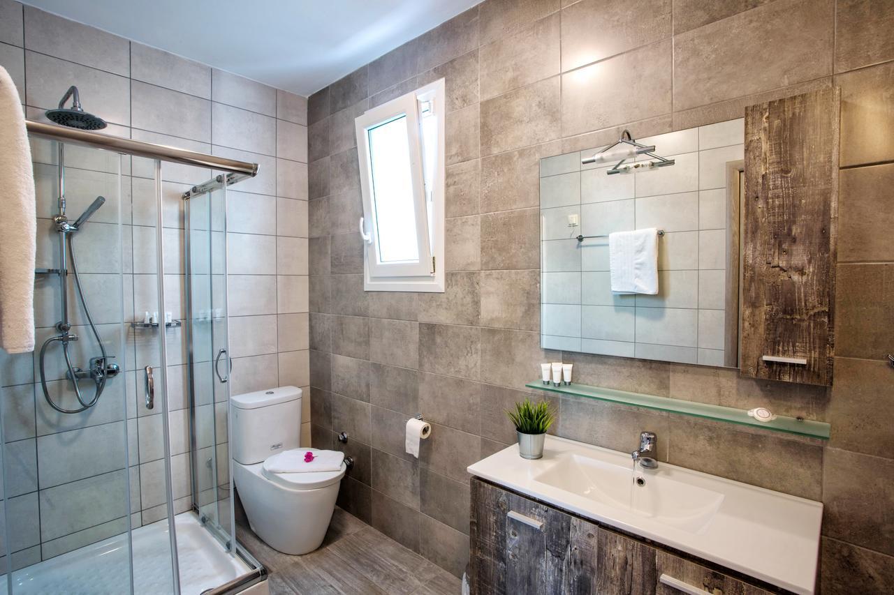 Isalos Suites Néa Péramos Εξωτερικό φωτογραφία