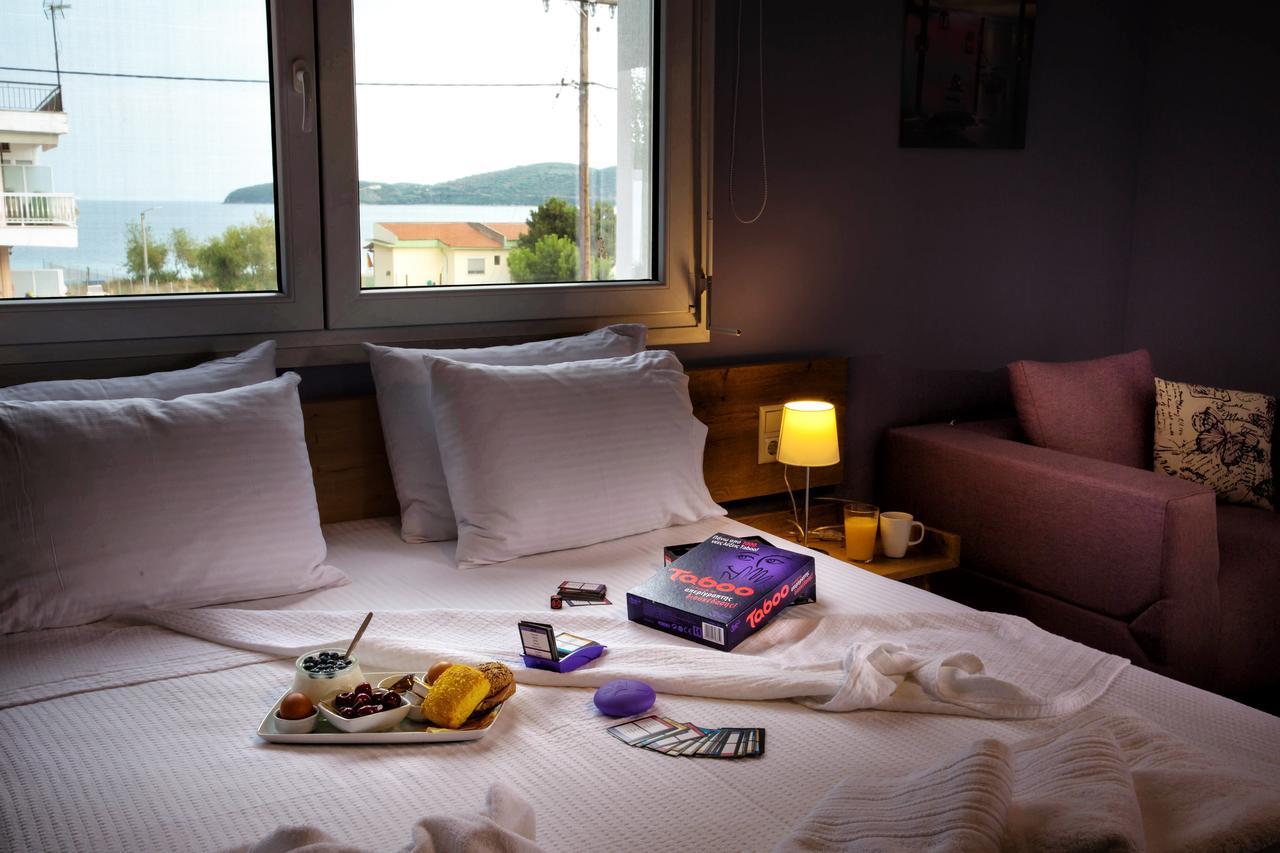 Isalos Suites Néa Péramos Εξωτερικό φωτογραφία